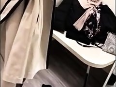 Striking ebony teen blows a black cock in a dressing room