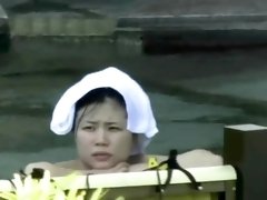 Voyeur spying on amateur Asian ladies in public shower