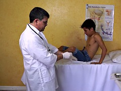 Asian twink fucked by a sex toy by a doctor in his office
