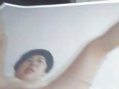 Man Masturbating over Photo of Mrs Pat Wong